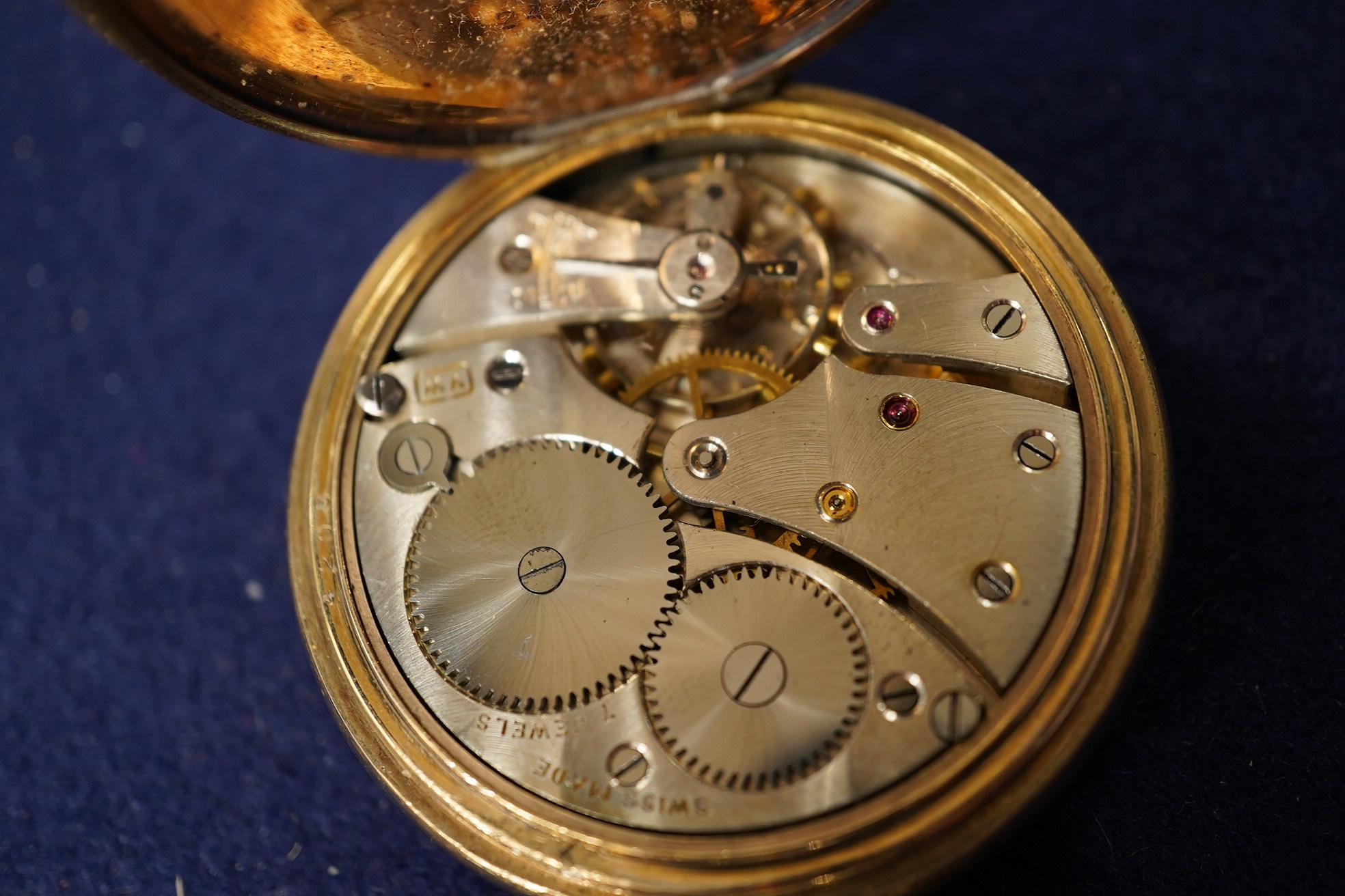 A gold plated Vertex hunter pocket watch and a George V silver mounted glass desk timepiece, with pig finial, height 95mm. Condition - poor.